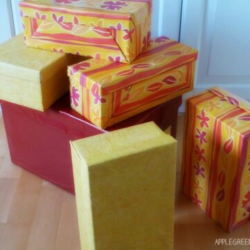 boxes with paper wrapping as diy storage