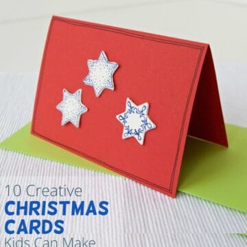 a paper christmas card made with red and green cardstock and white clay stars