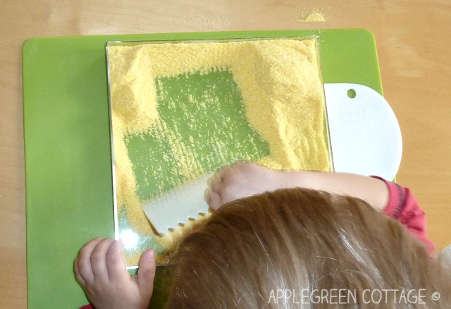 sensory activities for kids - corn meal