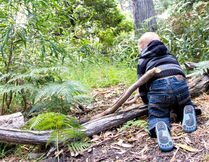 toddler climbing a tree stomp 