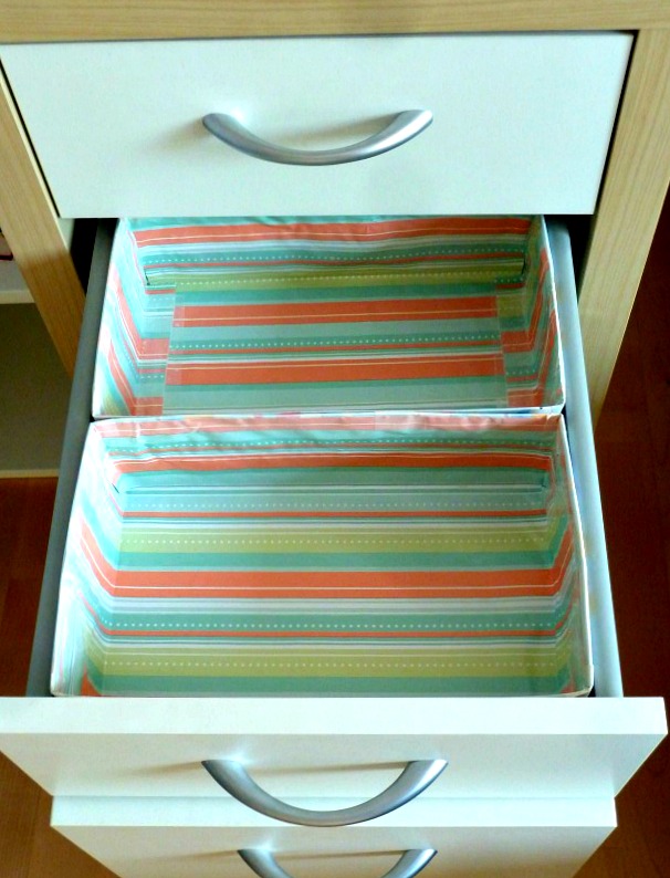 homemade drawer organizers placed in a drawer for convenient storage