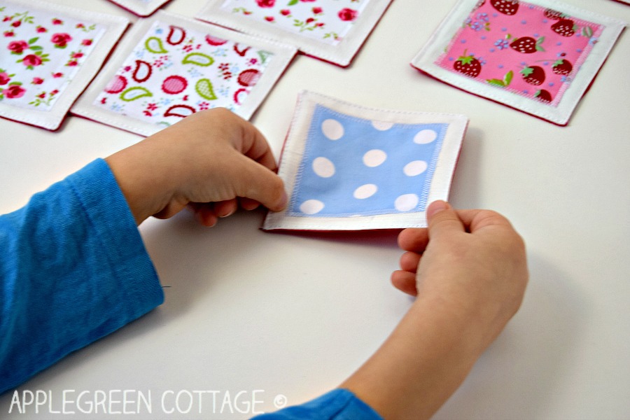 kid playing diy memory game