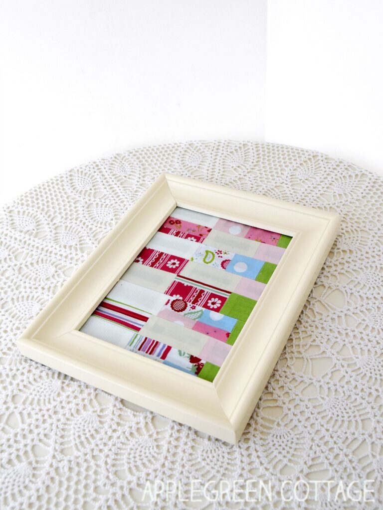 How to frame a piece of fabric patchwork to make your crafting corner even prettier! It's an easy DIY for sewing enthusiasts - put your beautiful mini quilts on display and decorate your home like a pro!