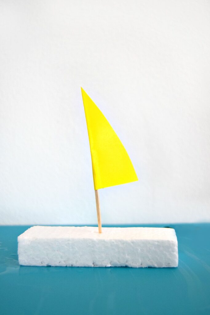 How to make easy DIY sailboats out of styrofoam packaging. A great water play idea for the summer your kids will love! 