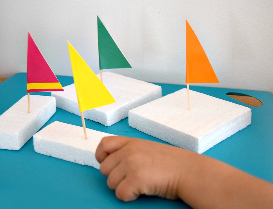 How to make easy DIY sailboats out of styrofoam packaging. A great water play idea for the summer your kids will love! 