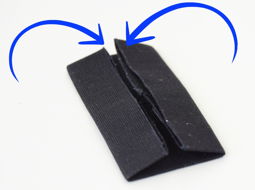 a folded piece of black fabric