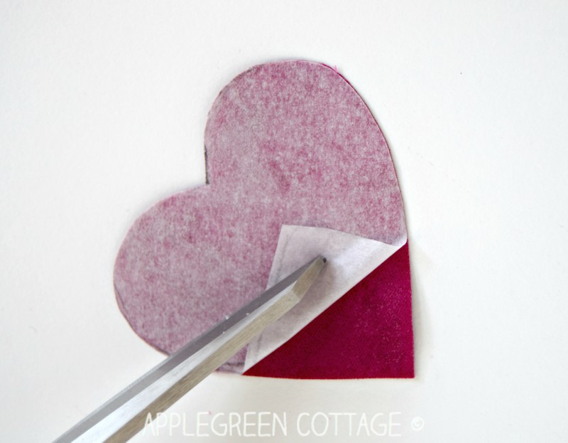 removing paper from heart applique using scissors tip