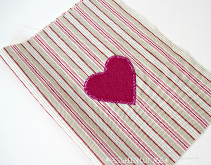 heart applique with fusible web on fabric