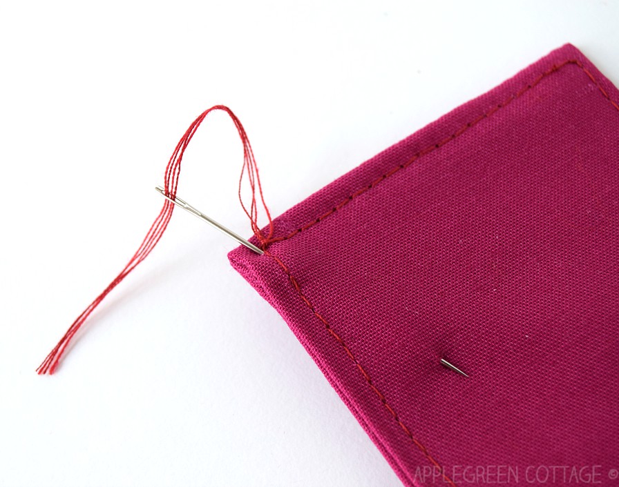 using needle to hide thread ends