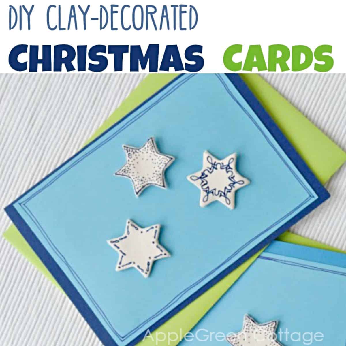finished air dry clay christmas cards with embellishments on blue cardstock