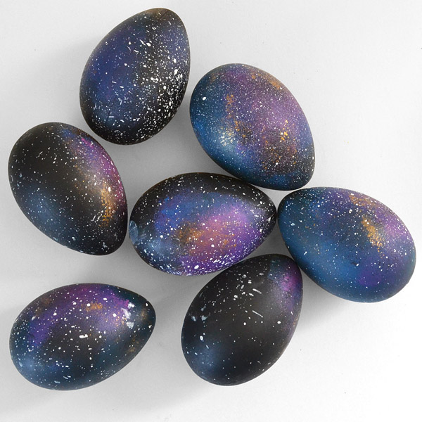 dark blue easter eggs painted with sparkles