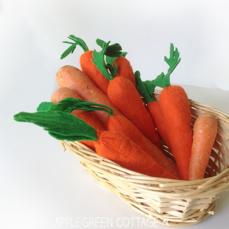 diy felt carrot decorations set in a basket 