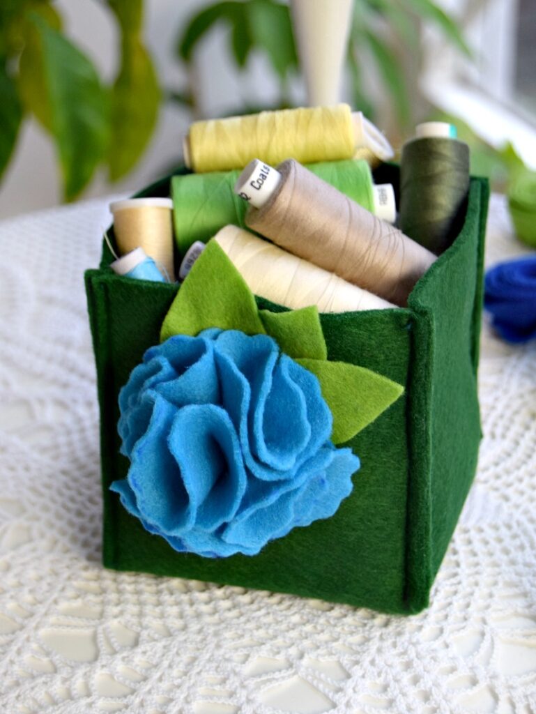 felt storage box filled with thread spools