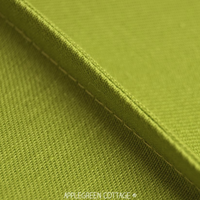 green upholstery fabric sewn with french seam