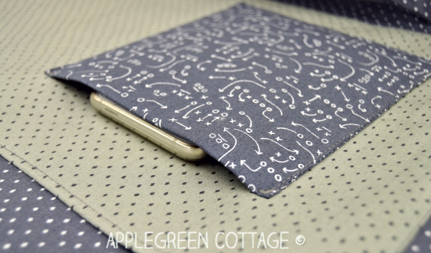 messenger bag pattern with pockets blue phone pocket on teh inside of a large messenger bag