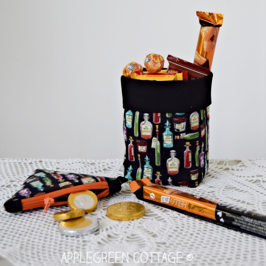 black and orange diy halloween basket and a diy pouch for Halloween candy