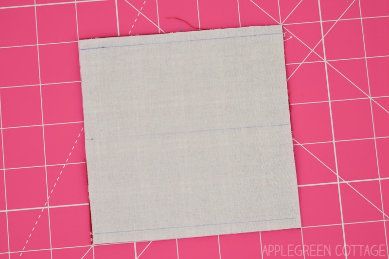 four patch marking on a square quilt block