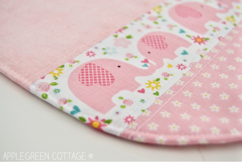 pink baby bib pattern detail