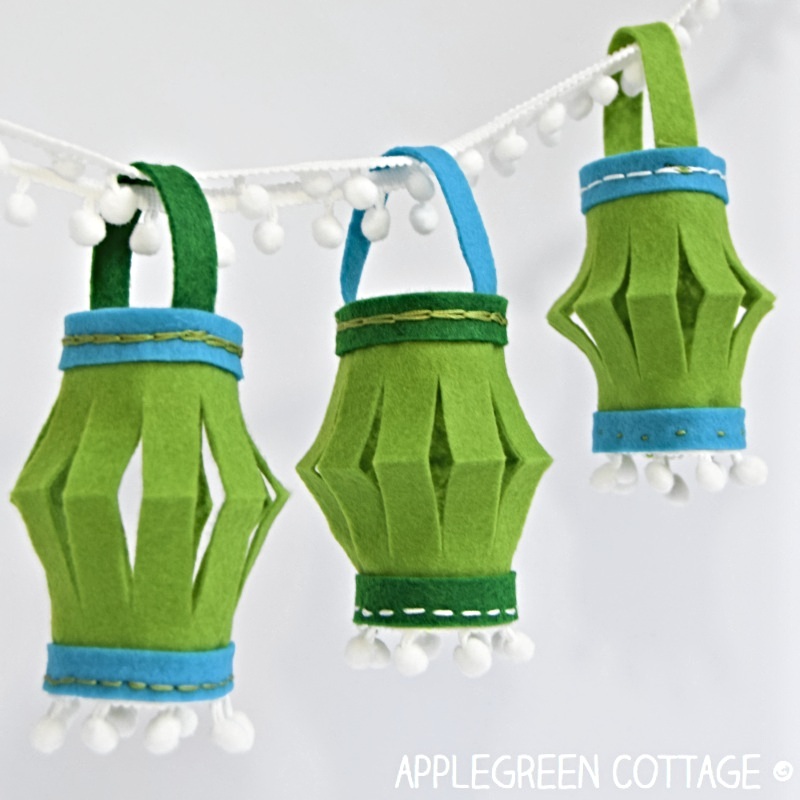 diy green felt lanterns made with a piece of felt and handsewn