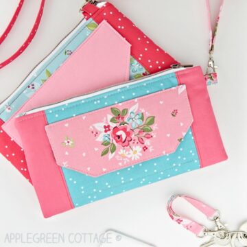 two finished wallet bags in floral design on a table