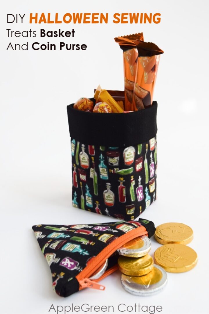 a halloween fabric themed fabric basket filled with halloween candy