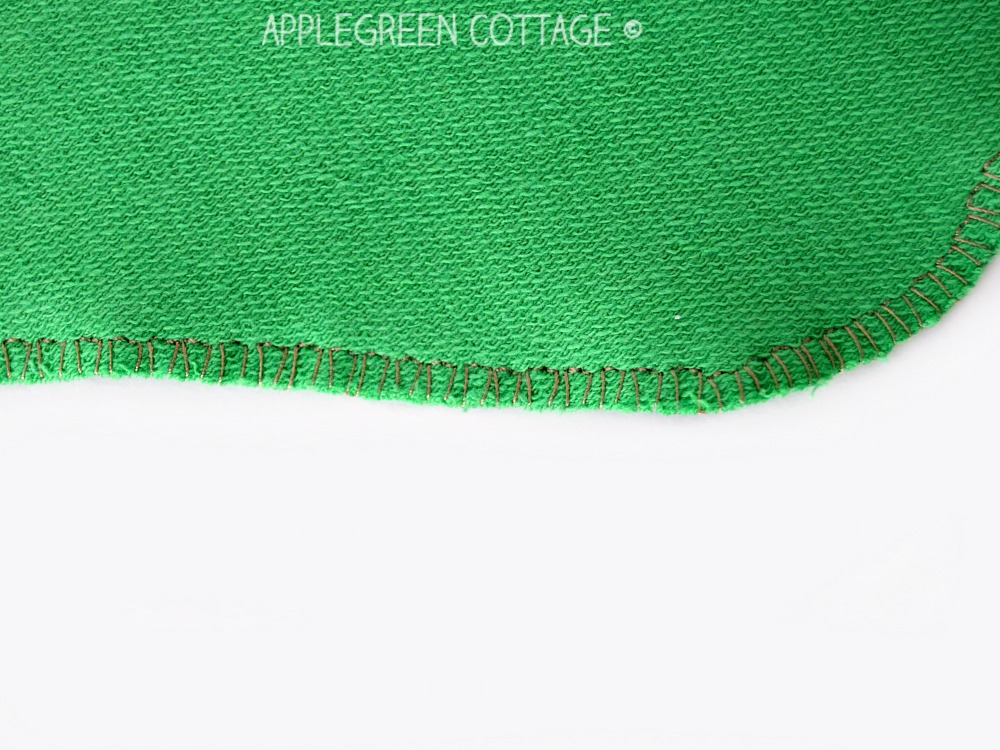 two pieces of green french terry sewn together using a stretch stitch