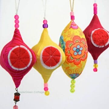 finished fabric baubles and finial ornaments for a Christmas tree