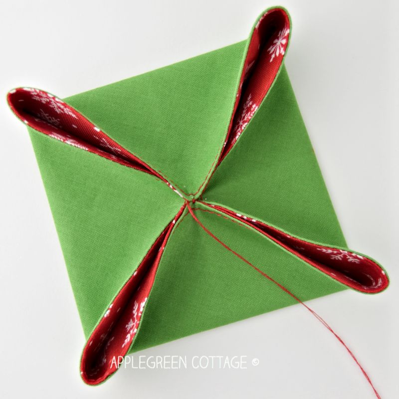 square shaped green Christmas origami ornament