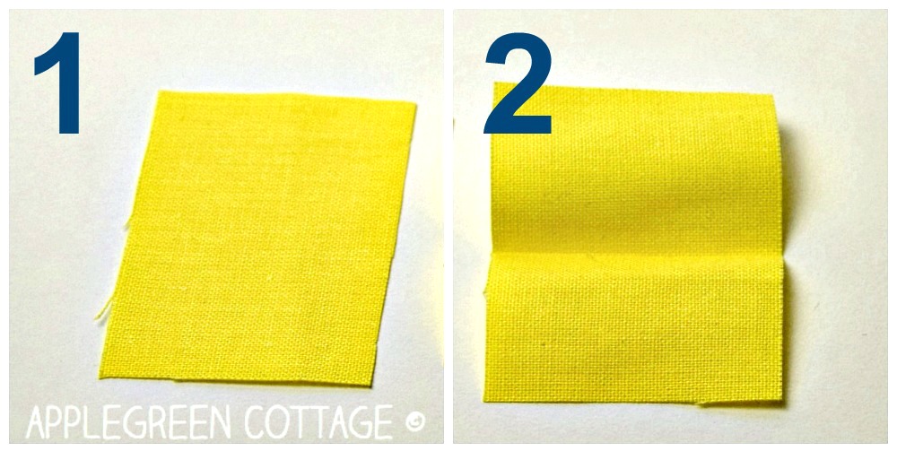 a small yellow fabric piece with a center crease