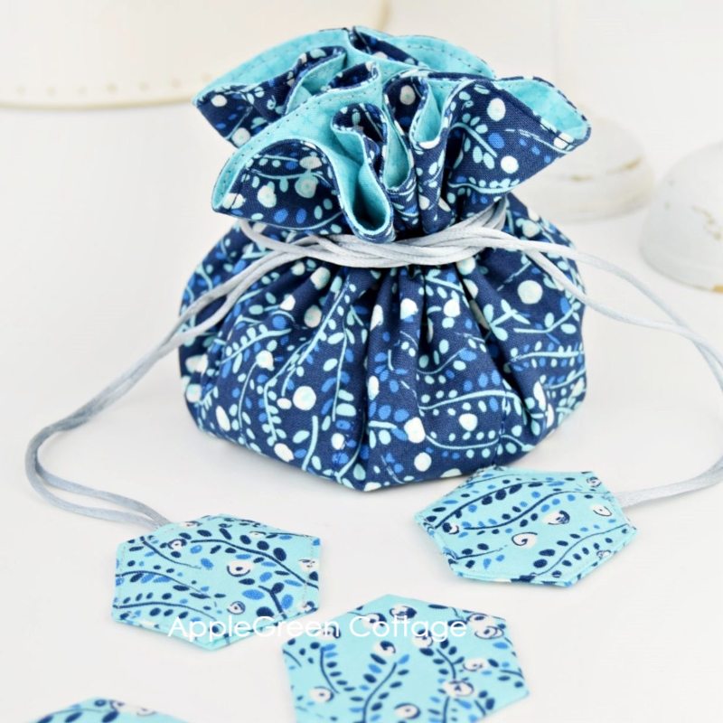 a finished blue fabric diy jewelry organizer with drawstring