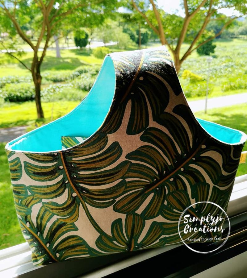 finished single-hand fabric tote sewn with floral designer fabric with nature background