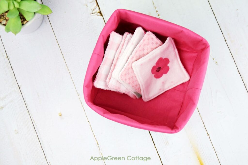 makeup remover pads stored in a handmade fabric basket