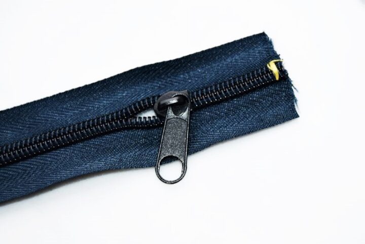 a nylon coil zipper with an end of the zipper tape cut off