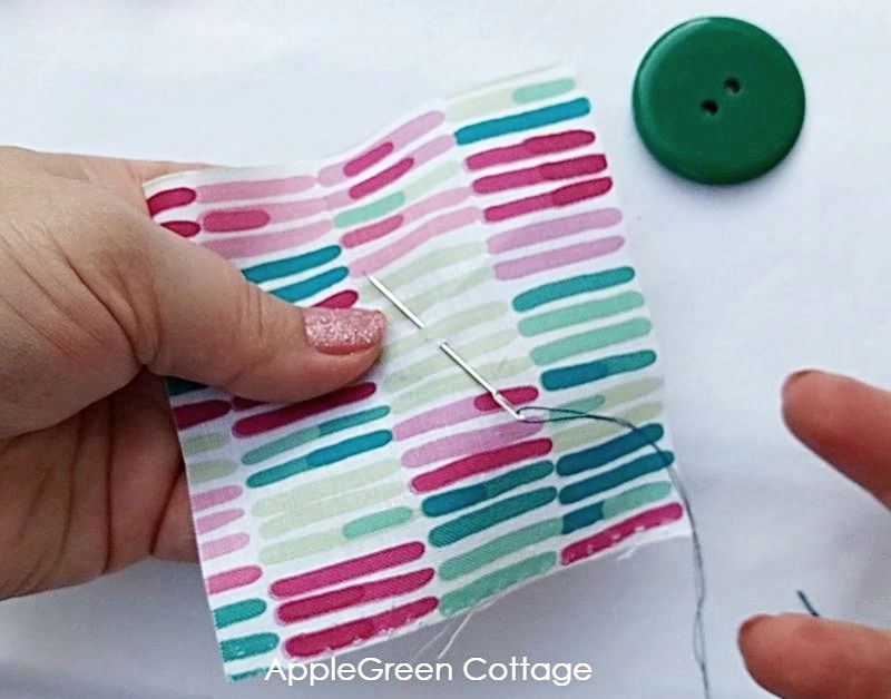 how to start sewing a button by hand