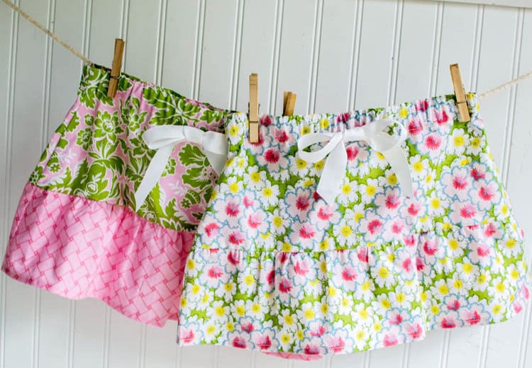 two easy to sew floral handmade girl skirts with ruffles and a hideen elastic band. 