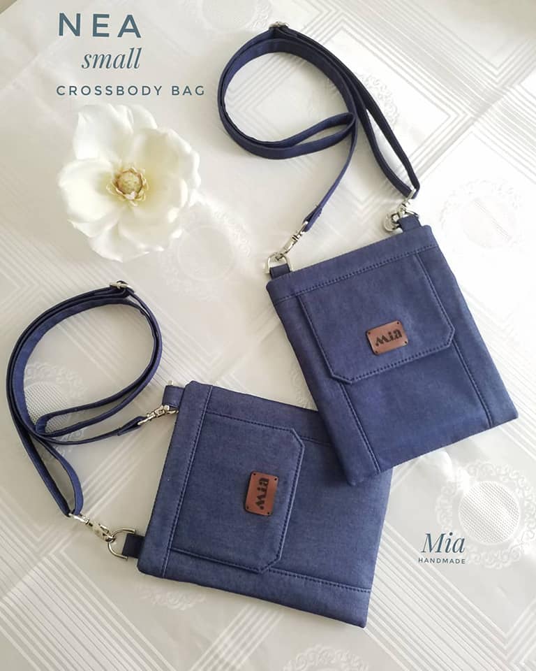 two blue small crossbody bags sewn with an applegreencottage pattern