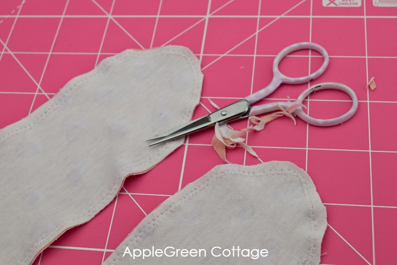 scissors trimming the sewn headband