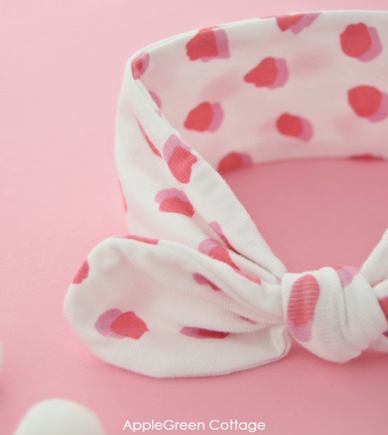 bunny-ear headband sewn with soft jersey in white and pink