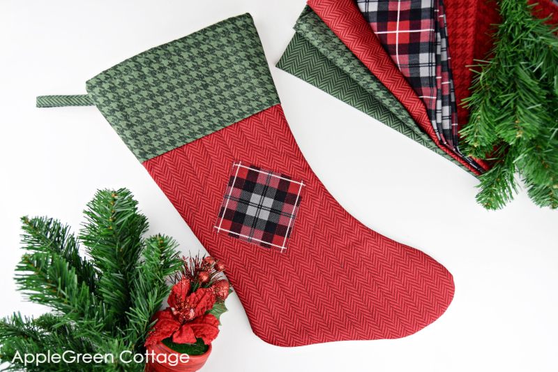 red diy christmas stocking sewn with plaid fabric