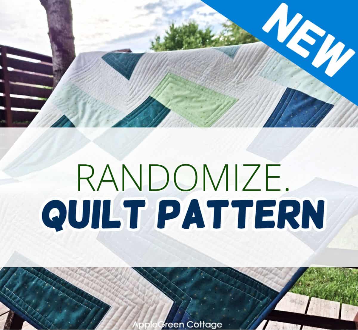 a finished modern quilt in white, aqua, green and teal on a garden bench in a backyard