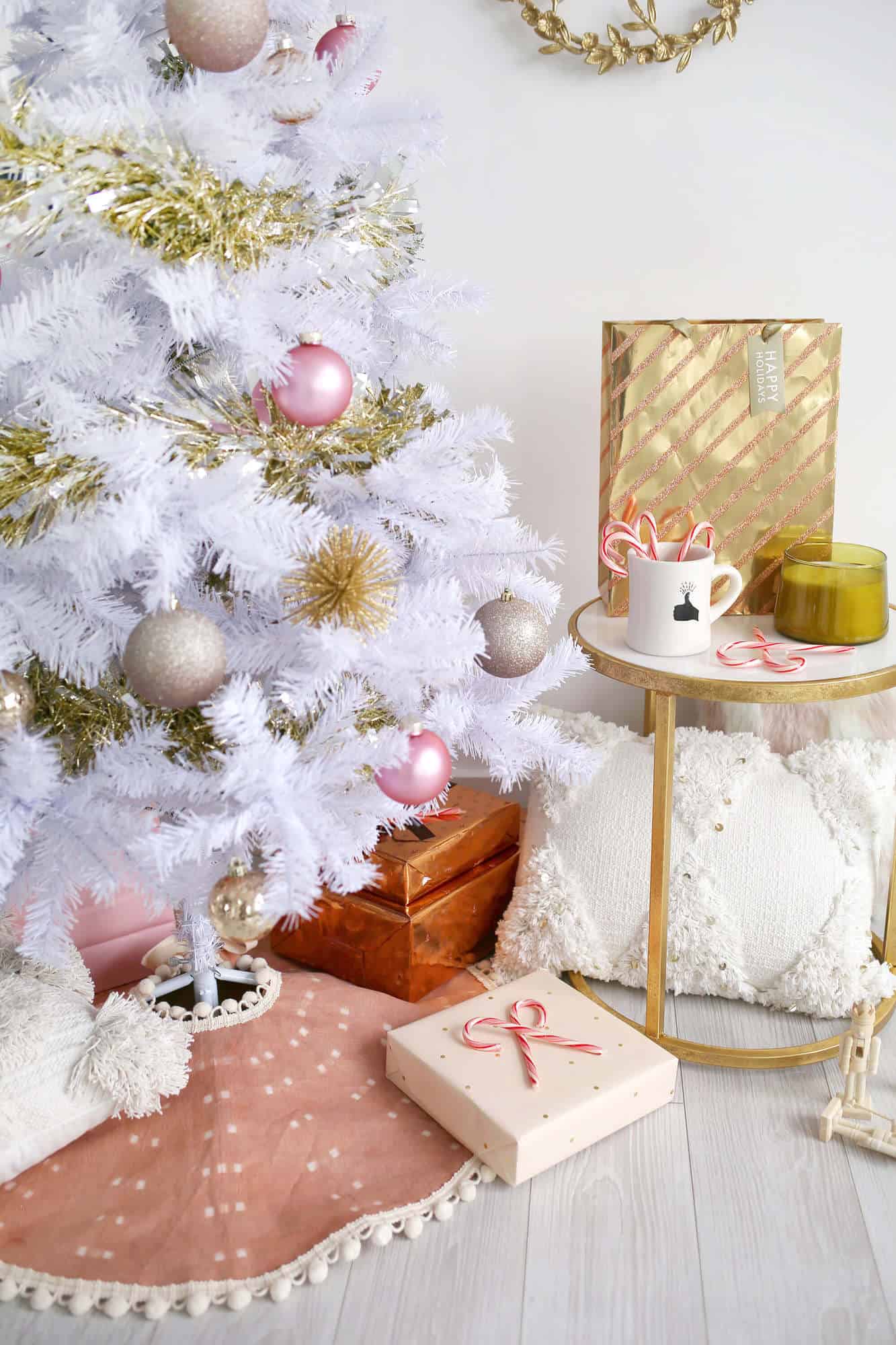 naturally dyed christmas tree skirt with a white christmas tree and with gold accents