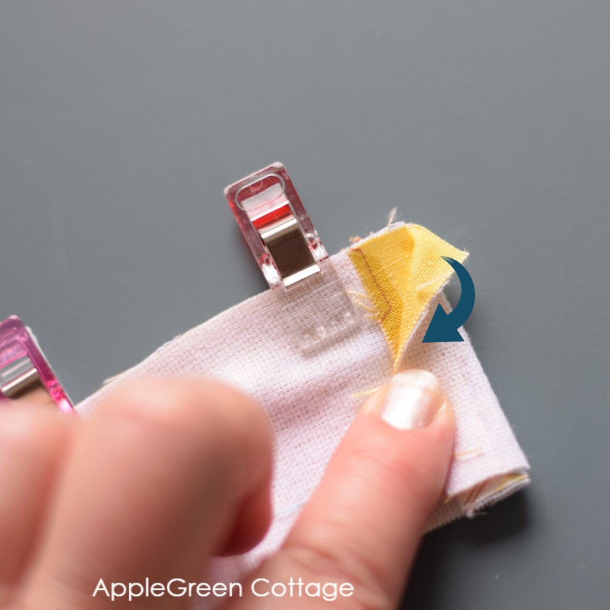 fabric folded around the zipper teeth to be sewn onto the zipper tape