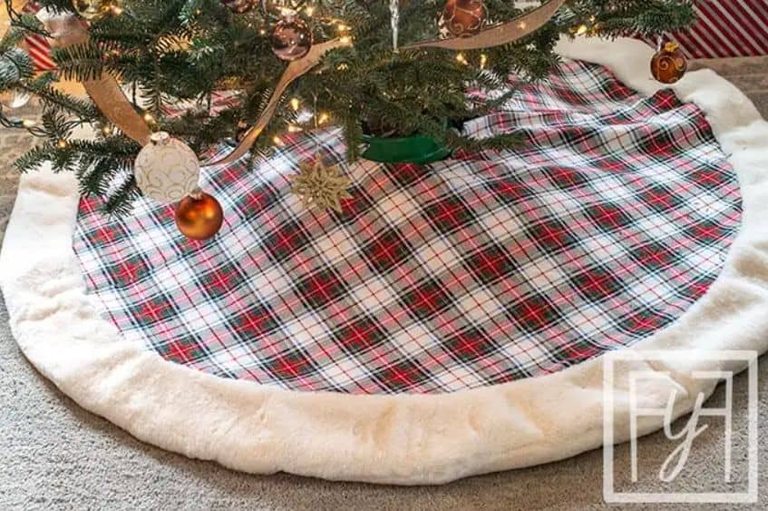Tree skirt A homemade traditional plaid tree skirt made with an online tutorial, and woith a faux fur trim.