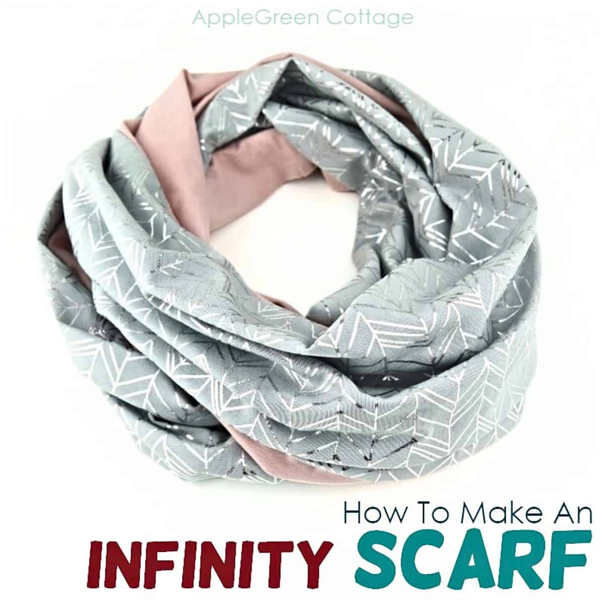 a finished knit jersey infinity scarf softly wrapped on a white surface.