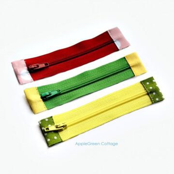 Three zippers shortened and with fabric tabs added.