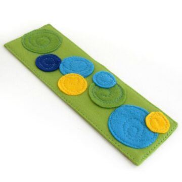 finished fabric bookmark with appliqued felt circles