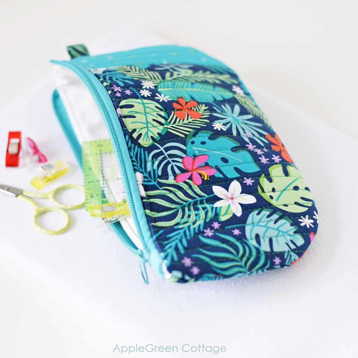 finished floral zipper pouch with quited seams and a nylon coil zipper