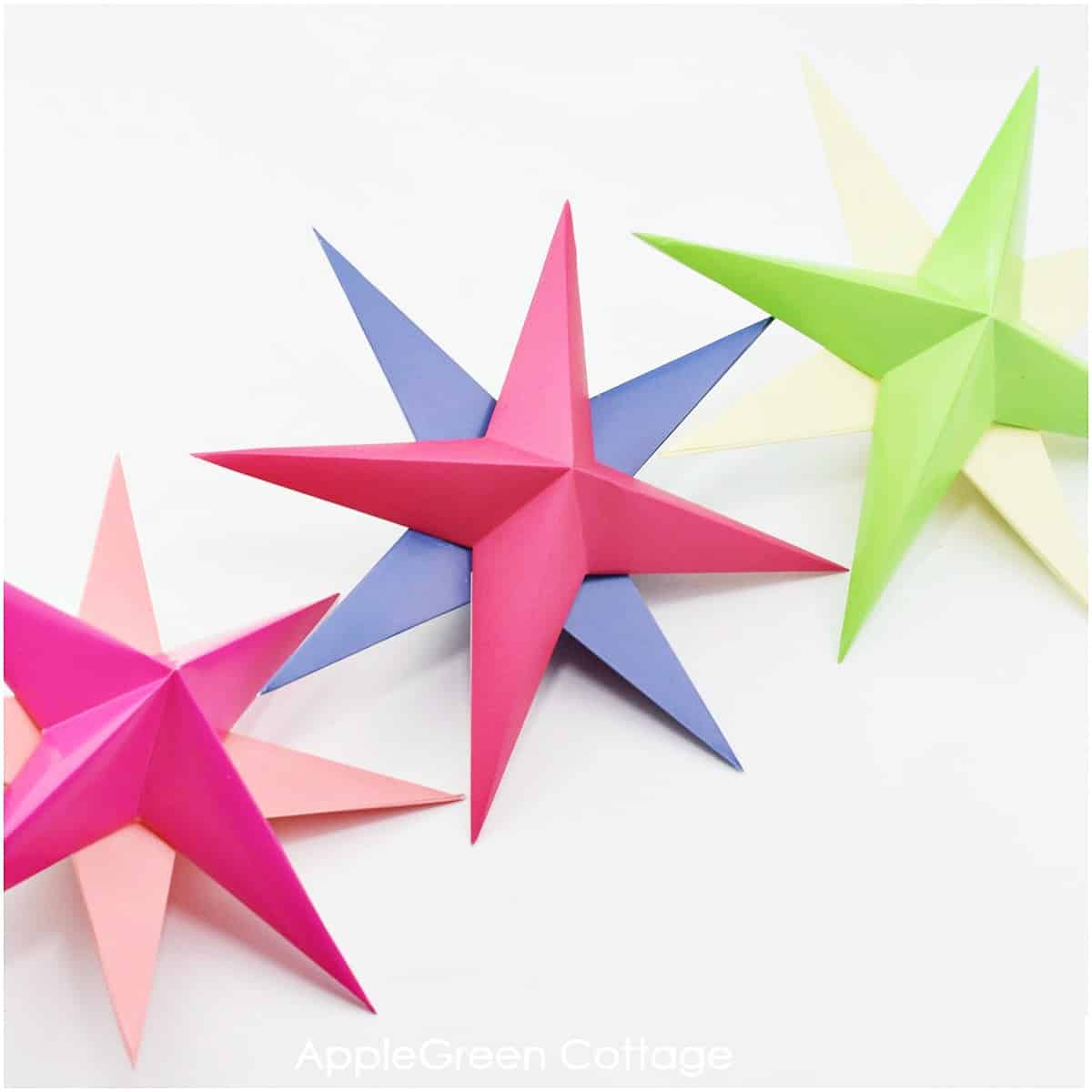 Brightly colored origami paper stars on black back