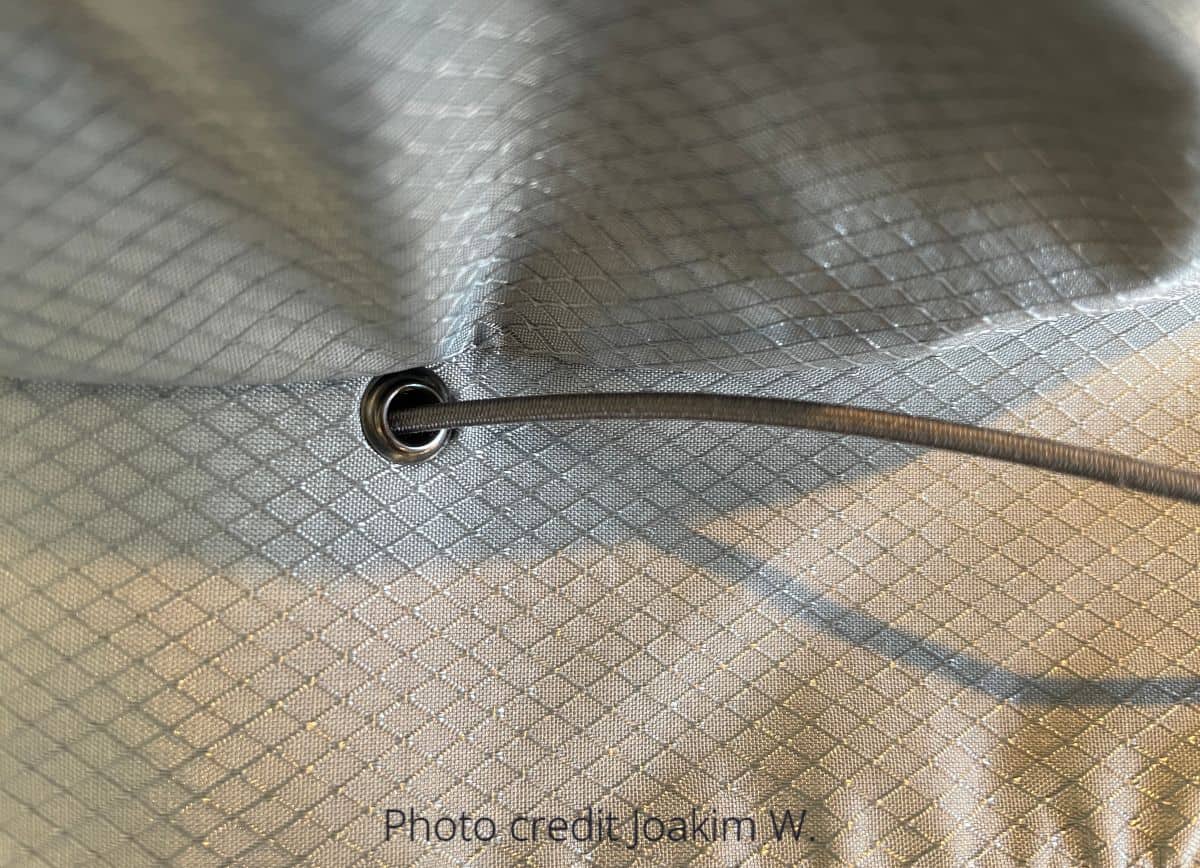 a finished bucket hat with the grommet installed to make a chin strap.