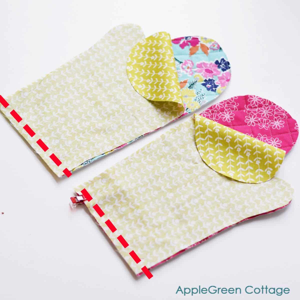 two stacks of fabric to be sewn together at the top
